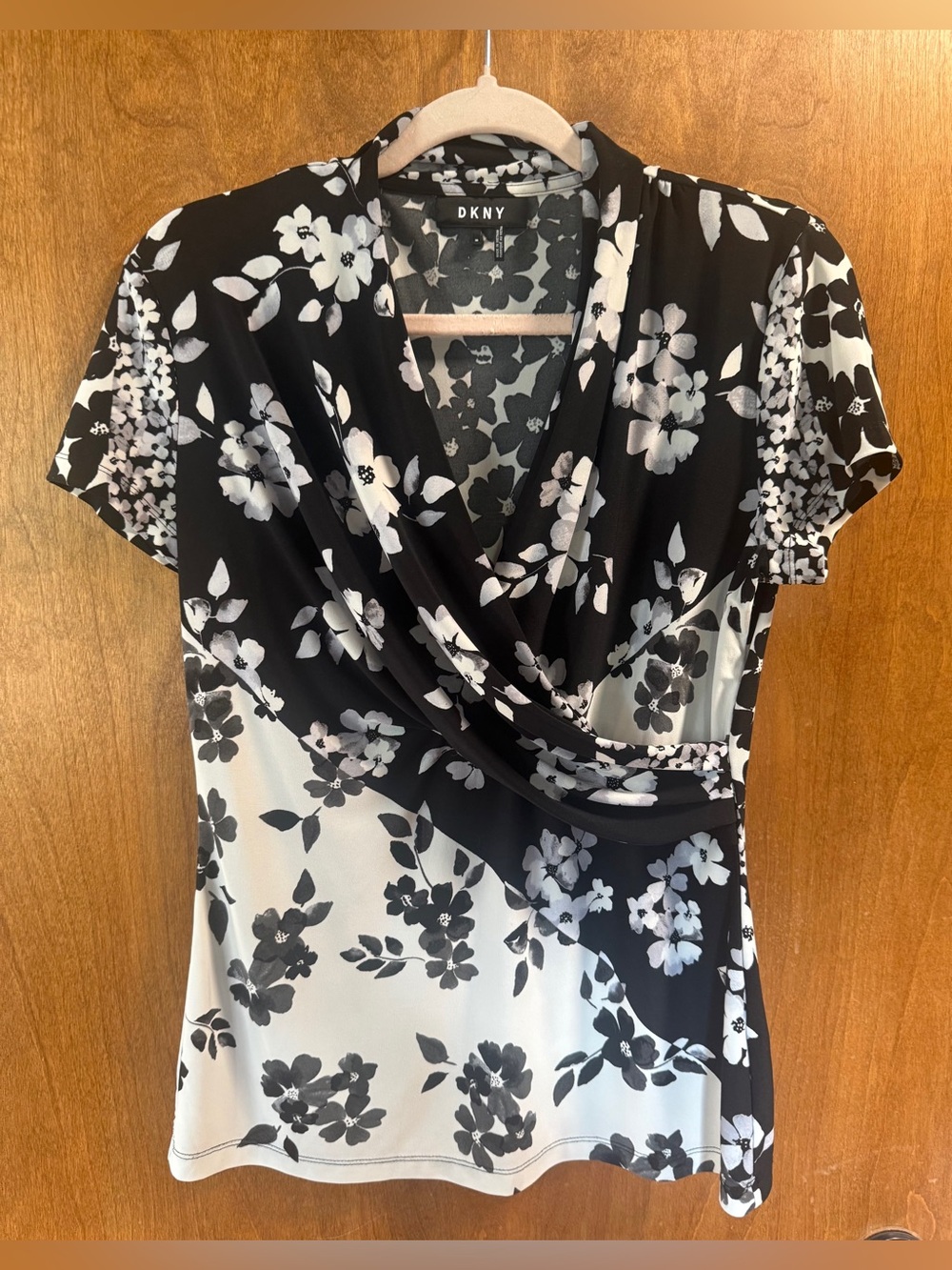 Women’s medium DKNY Black & White Floral Wrap-Style Short Sleeve top blouse